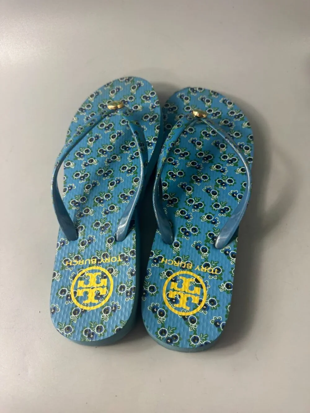 Tory Burch All Over Print Flip Flops in Blue